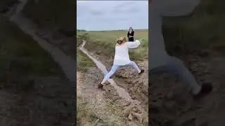Girl&rsquo;s Epic Jump Fail! 😂 Missed Step Lands Her in Mud! #shorts #fails