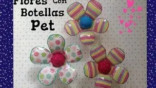 FLORES HECHAS CON BOTELLAS  PET CUBIERTAS CON TELA .- PET FLOWERS