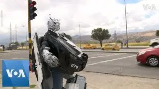 Colombian Transformer Makes a Living at Traffic Stop