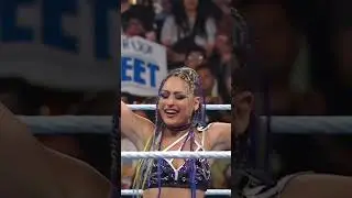 Giulia victory pose on Zelina Vega