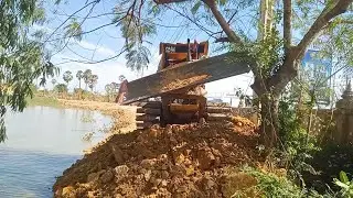 Skill Operator Dozer Cutting Forest Pushing Soil To Slop Water And Mini Dump Truck Working Unloading