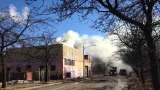 Building next to warehouse in Detroit catches fire during renovation work