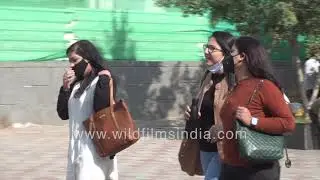 Delhi girls exit Sarojini Nagar Metro Station, follow Covid mask protocol, crowded markets once more