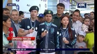 Казахстанские олимпийцы показали медали и поделились планами