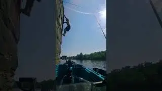Mini deep water solo with a backflip off an old bridge support
