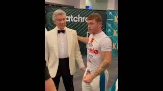 Canelo takes a photo with Michael Buffer