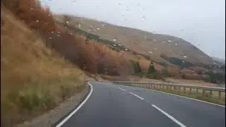 Autumn Road Trip Drive With Bagpipes Music On A82 Route On History Visit To Highlands Scotland