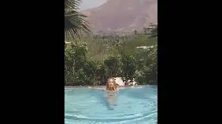 Sydney Sweeney's infinity pool serenity:🌴💦 Who's ready for paradise? #SydneySweeney #BikiniBliss