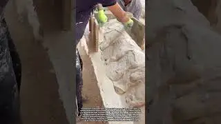 Shaping Wet Plaster Cement with Wooden Molds in Construction Projects