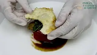 Sous vide cod with oyster disk, and kale glazed with tapioca crisp #IndianCulinaryAcademy #culinary