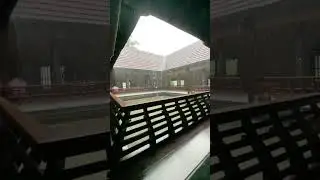 Kerala monsoon view in  a traditional &lsquo;Naalukettu&rsquo; house.