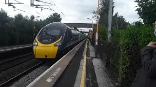 Trains and Planes at Marston Green. WCML. 19/06/2021.