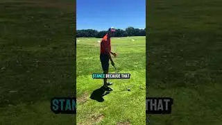 Demonstrating to a student how to deliver the club more from the inside and dynamically square the