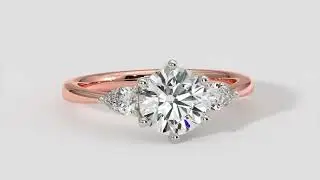 Round Brilliant Cut Diamond Ring With Pear Shape Side Diamonds In Rose and White Gold &ndash; ADN