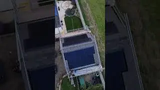 A lovely east west split solar array on a slate roof.