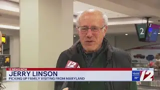 Travelers reunite with loved ones at T.F. Green on Christmas Eve