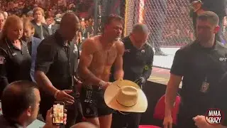 Diego Lopes LIMPS as he exits the octagon after his UFC 325 loss to Alexander Volkanovski
