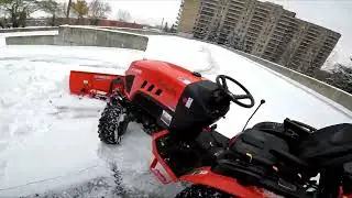Launching snow off parking garage roof
