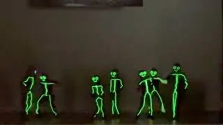 Kids Perform A Dance in Light-Up EL Wire Stick Figure Costumes