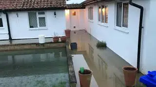 Flooding in The Street, Holywell Row