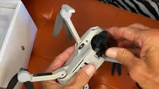 How to remove and reattach the gimbal cover on a dji mini 2 drone