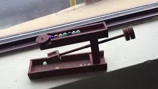 Fun Handmade Wooden Toy with Marbles