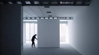 CASE-REAL installs movable walls inside a basement art gallery in tokyo