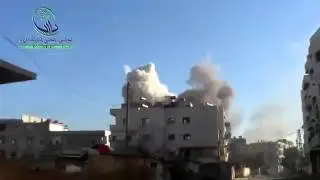 Syrian Air Force Jet Drops Large Bomb On Apartment Building