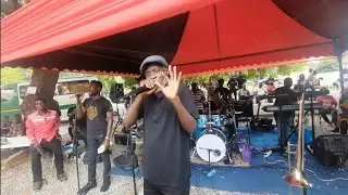 Baba spirit's look alike doing this dance with shakers band manager