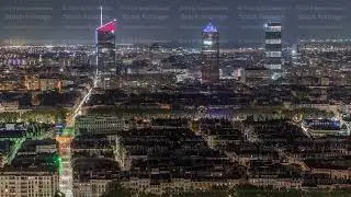 Panoramic aerial view of Lyon with skyscrapers from Fourviere Hill at night. France