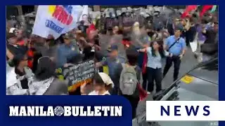 Protesters clash with QCPD during protest vs DPWH budget deliberation