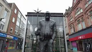 Autistic Bobbie Films a Shopping Audit, while Fat Steve Shelters from the Rain in a doorway #bolton