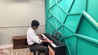 Dhruva Playing Solas on the Piano