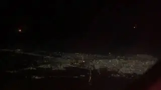 A view from Qatar airways at night above Baghdad from 40000 feet.