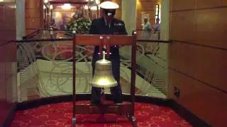 QM2 Ringing the ship's bell at midday