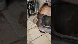 Out with the old: Removing the rusty trunk from my 1965 Buick Wildcat.