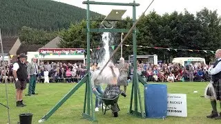 Tilt The Bucket open challenge during the 2019 Ballater Highland Games in Aberdeenshire Scotland