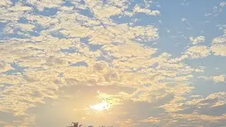 Golden Sunrise Through Morning Clouds
