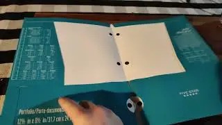 Teal Colored Five Star Four Pocket Folder. Comes With Reference Guide