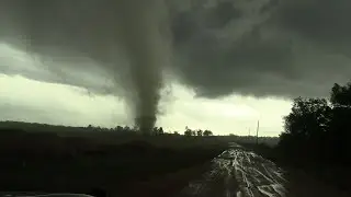 Drill Bit Tornado Seen Tossing Debris As It Moves Across Field In Leslie, GA
