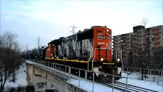 SHORT CN TRAIN WITH GP-38 LOCOMOTIVE LONG HOOD FORWARD