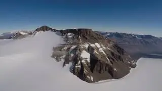 Helicopter flight from Mt JJ Thomson to Mt Cerberus, Dry Valleys, Antarctica