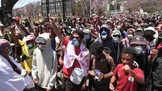 Protesters march in Madagascar capital despite president's promise to resign | AFP