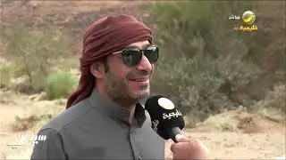 ثلاثة مغامرين يستكشفون أرض بركانية في منطقة تبوك