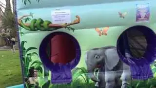 Inflating Our Fun Run/Assault Course 9X28 Jungle Themed Bouncy Castle