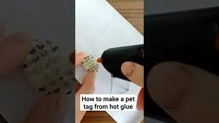 This is how to make a pet tag out of hot glue and paper.
