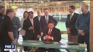Florida governor bans vaccine passports, suspends COVID-19 local emergency orders