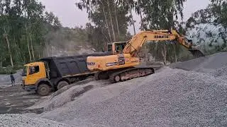 Komatsu pc-210 loading in 12tyre tipper 