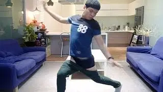 Man puts on his pants with no hands