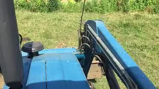 Ford 4630 tractor hauling  rock